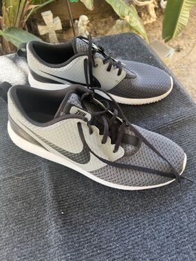 Nike Men’s Gray and Black Breathable Sneakers